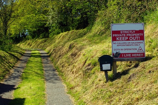 illegal sign on footpath